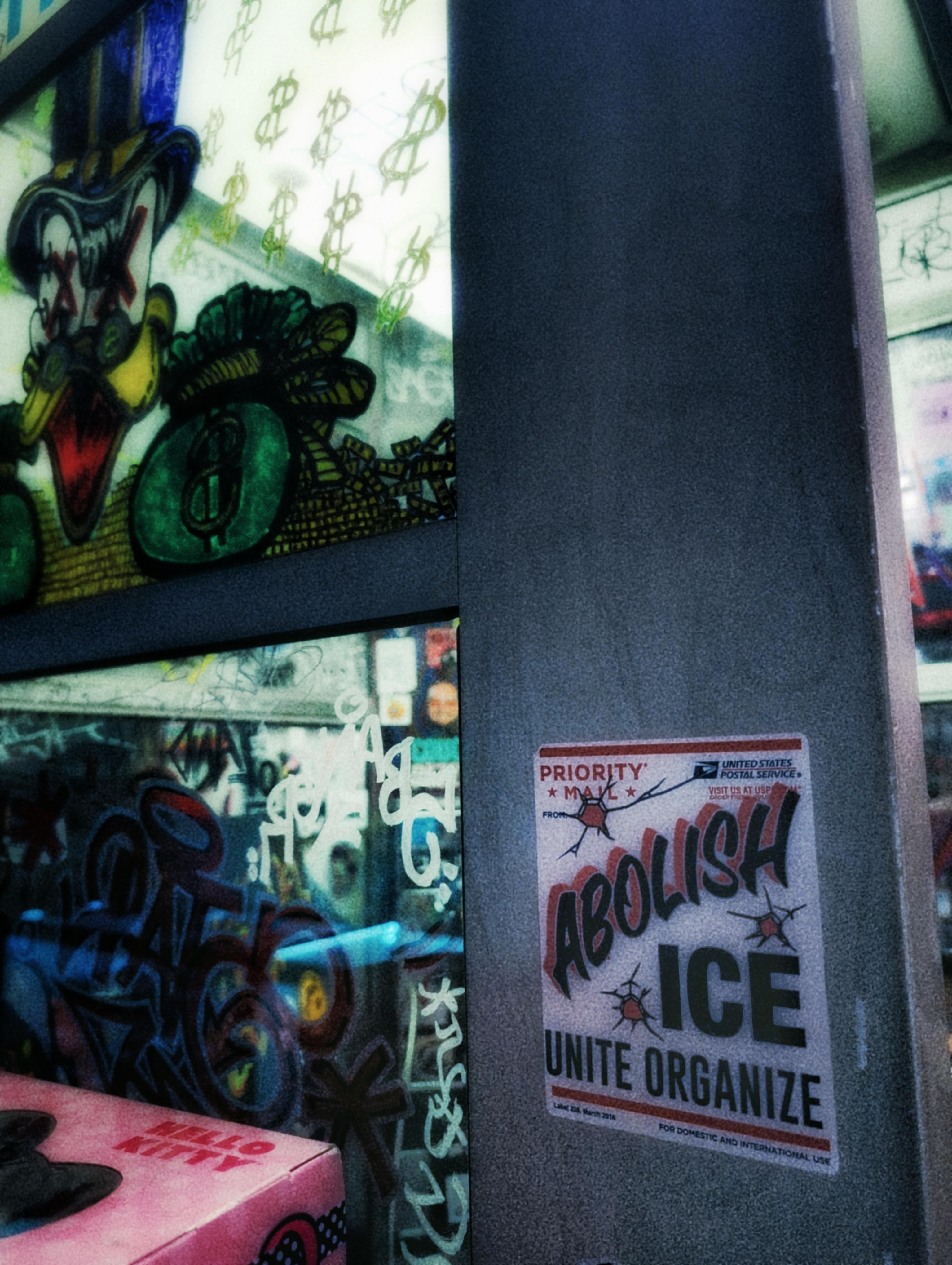 abolish ice sticker on phone booth